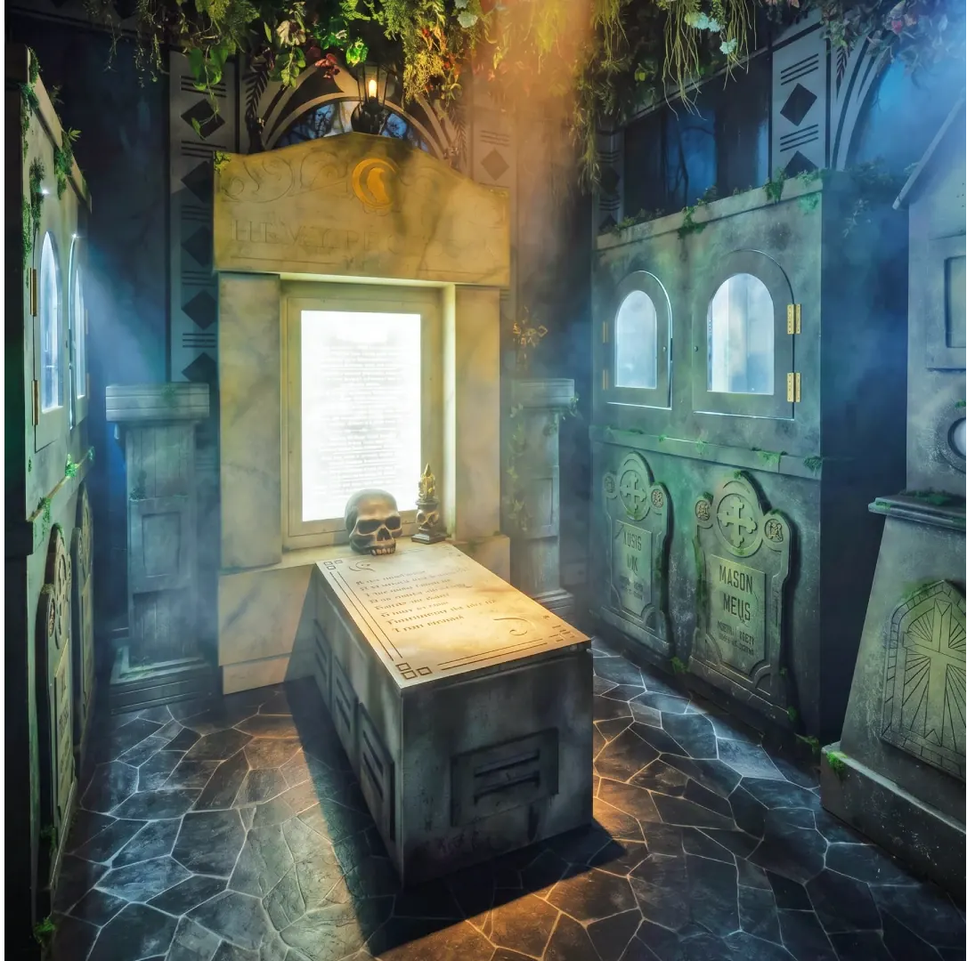The Crypt escape room with stone sarcophagus and tomb theming